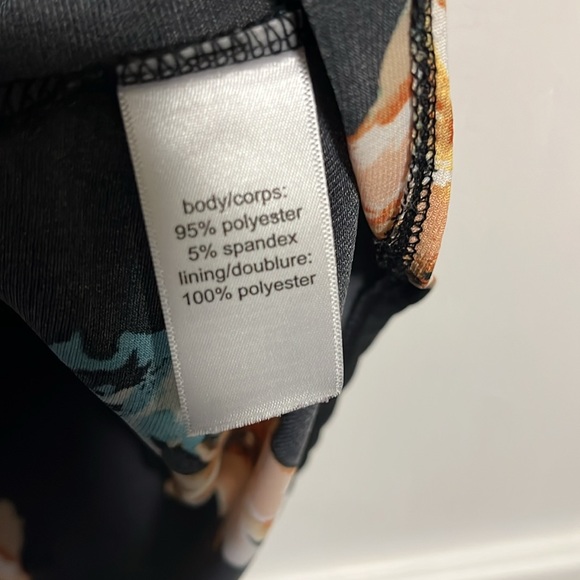 Short sleeve black dress with orange flowers - Picture 2 of 5